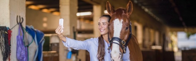 Female vet taking selfie with horse in stable Model Released Property Released xkwx 20s, You Female vet taking selfie with horse in stable Model Released Property Released xkwx 20s, Young Adult, Woman, Female, Caucasian, Vet, Using, Mobile Phone, Standing, Horse, Stable, Animal, Loving, Domestic Animal, Veterinarian, Beautiful, Medical, Professional, Specialist, Job, Check Up, Working, One Animal, Mammal, Livestock, Herbivorous, Paddock, Equestrian Center, Care, Together, Occupation, Selfie, Photographing, Happy, Smiling, Toothy Smile, Smartphone, Wireless Technology, Phone, Holding, Communication, Connection, Wireless, Cellphone, Technology, Uniform, Indoors 